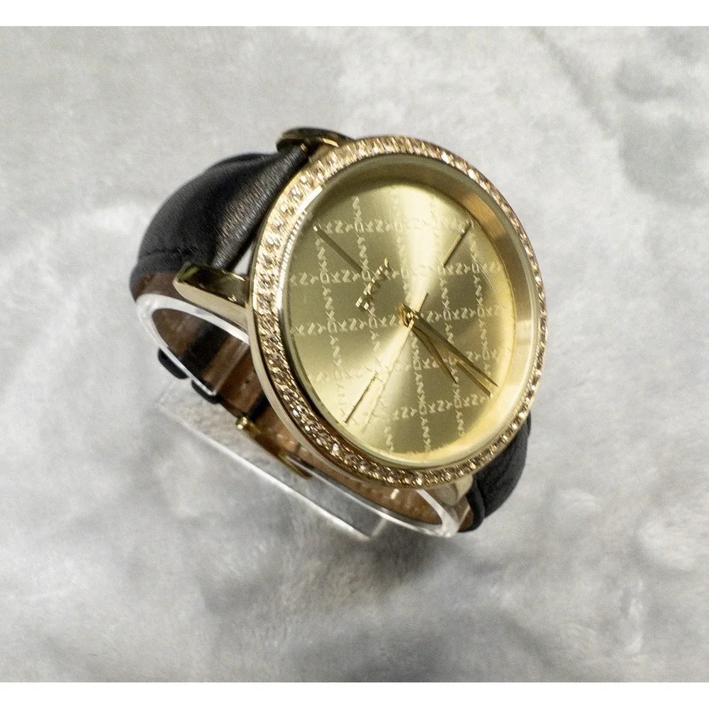 DKNY 111007 Gold Tone All Over Logo Womens 43mm Wristwatch Gem Set Bezel